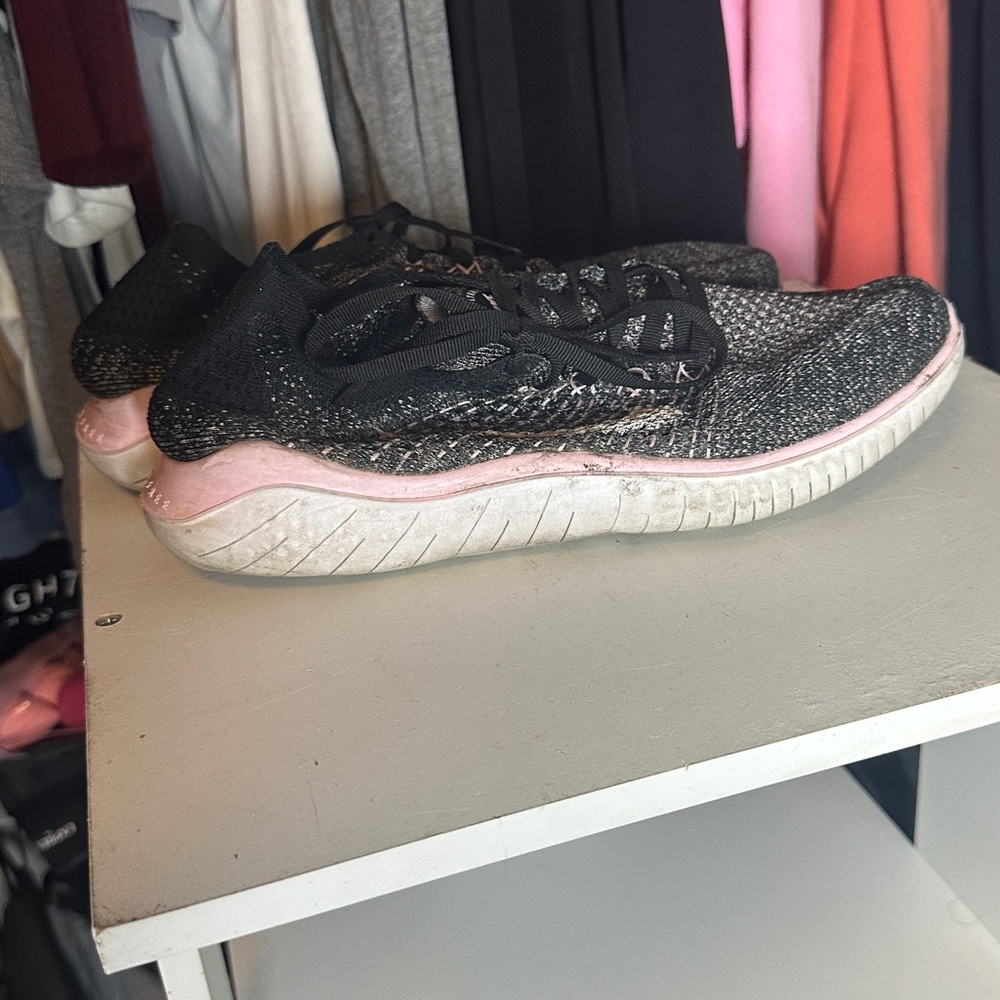 Nike Black and Pink Athletic Shoes with Cushioned Sole and Breathable Upper